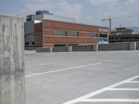 a parking lot and wall are pictured in a photo from the perspective point of view