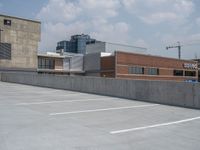 a parking lot and wall are pictured in a photo from the perspective point of view