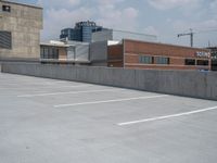 a parking lot and wall are pictured in a photo from the perspective point of view