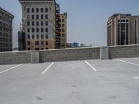 a parking lot and wall are pictured in a photo from the perspective point of view