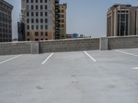 a parking lot and wall are pictured in a photo from the perspective point of view