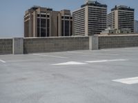 a parking lot and wall are pictured in a photo from the perspective point of view