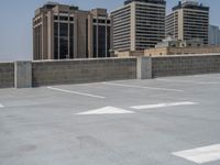 a parking lot and wall are pictured in a photo from the perspective point of view