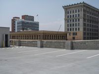 a parking lot and wall are pictured in a photo from the perspective point of view