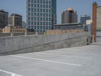 a parking lot and wall are pictured in a photo from the perspective point of view