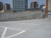 a parking lot and wall are pictured in a photo from the perspective point of view