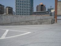 a parking lot and wall are pictured in a photo from the perspective point of view