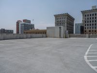 a parking lot and wall are pictured in a photo from the perspective point of view