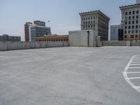 a parking lot and wall are pictured in a photo from the perspective point of view