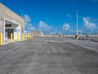 parking lot with empty, empty space in a commercial building complex on the beach side