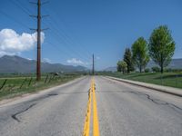 Straight Road in Rural Utah: Asphalt and Snow