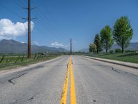 Straight Road in Rural Utah: Asphalt and Snow