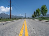 Straight Road in Rural Utah: Asphalt and Snow