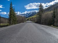 Straight Road Through Snowy Landscape in Ironton, Colorado