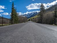 Straight Road Through Snowy Landscape in Ironton, Colorado