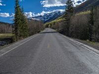 Straight Road Through Snowy Landscape in Ironton, Colorado