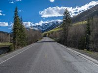 Straight Road Through Snowy Landscape in Ironton, Colorado