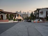 Straight Road in Suburban Los Angeles under Clear Dawn Sky