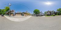 a fish eye view from the intersection of a residential neighborhood in the city of chicago