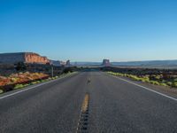 Straight Road in Utah and Arizona: A Dawn Landscape