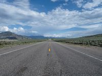 Straight Road in Utah: A Path Through the Clouds and Nature