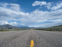 Straight Road in Utah: A Path Through the Clouds and Nature