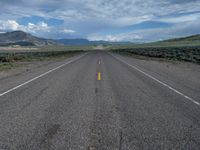 Straight Road in Utah: A Path Through the Clouds and Nature