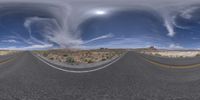 a 360 - view lens shot of the street in the desert with cloud formation above