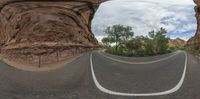 this is an image of a 360 - angle view of some kind of mountain road