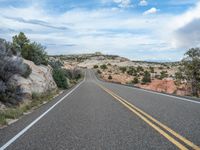 Straight Road in Utah, USA: Surrounded by Clouds