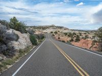 Straight Road in Utah, USA: Surrounded by Clouds