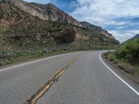 Straight Road in Utah, USA: Clouds and Mountains