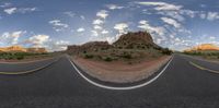 the road is wide and empty in this very big planet view fisheye photograph image