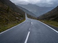 Straight Road Through Water and Highlands Mountain 002