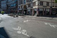 an image of a town with bicycles in the street corner to be seen in this photo