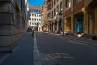 an image of people on their way to work in the city street with colorful markers