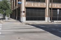 this is a street corner near an old building with an american flag and a traffic light in front of it