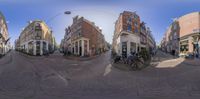 a picture of the streets of amsterdam during the day as if the mirror was taken in perspective