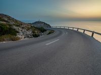 Stunning Dawn Landscape with Clear Sky over Coastal Road in Mallorca, Spain