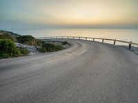 Stunning Dawn Landscape with Clear Sky over Coastal Road in Mallorca, Spain