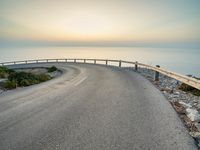 Stunning Dawn Landscape with Clear Sky over Coastal Road in Mallorca, Spain