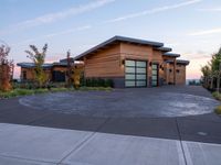 Suburban Home with Clear Sky and Contrails at Dawn