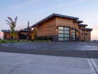 Suburban Home with Clear Sky and Contrails at Dawn