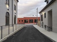 a road that has been paved and has stairs leading to the side of it,