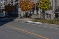 a yellow line is shown at a corner in front of houses and an apartment complex