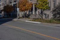 a yellow line is shown at a corner in front of houses and an apartment complex