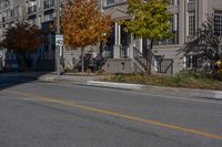 a yellow line is shown at a corner in front of houses and an apartment complex