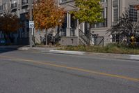 a yellow line is shown at a corner in front of houses and an apartment complex