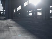 the sun shines brightly through windows in a large building as if the sunlight is falling off