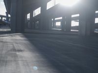 the sun shines brightly through windows in a large building as if the sunlight is falling off